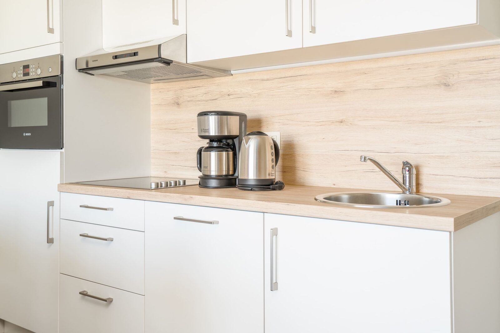 The kitchen in a suite at Holiday Suites