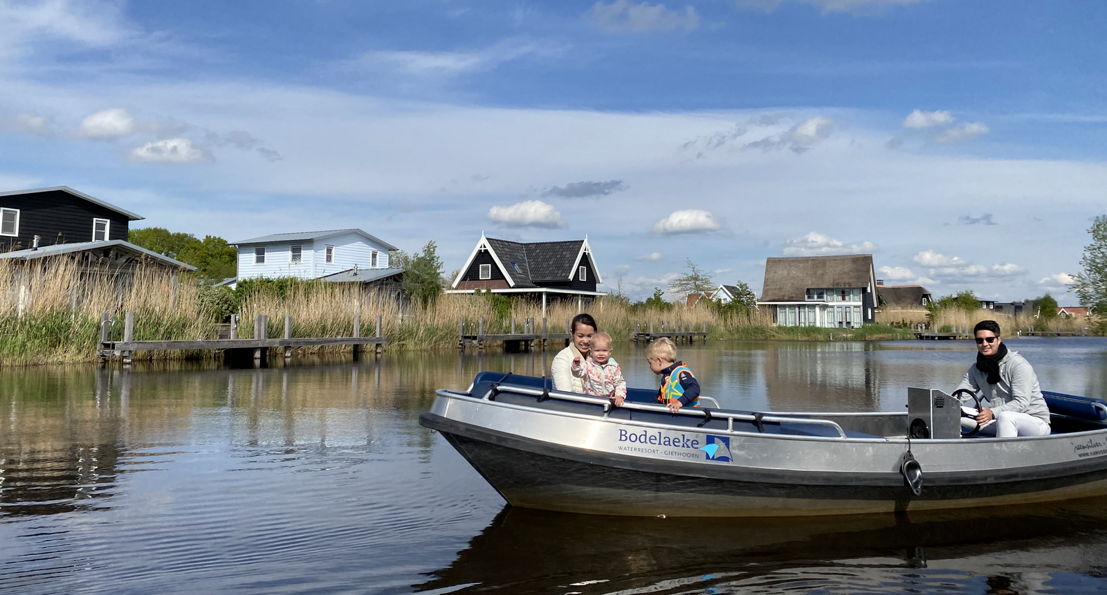 Family in sloop water sports