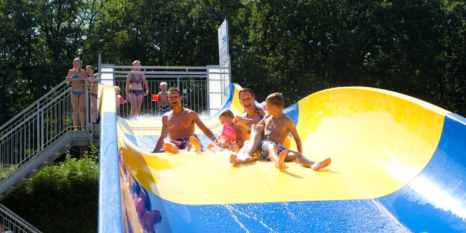 Down the awesome water slide with the whole family