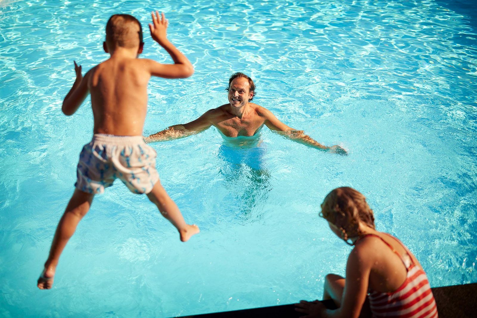 Swimming pool with a water playground