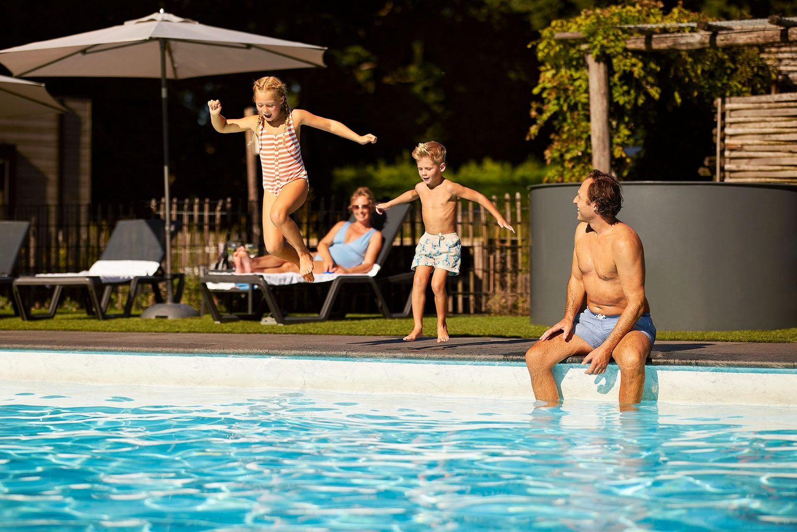 Swimming pool with a water playground