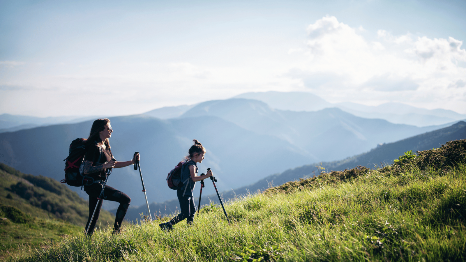 Mouther daughter hiking mountains