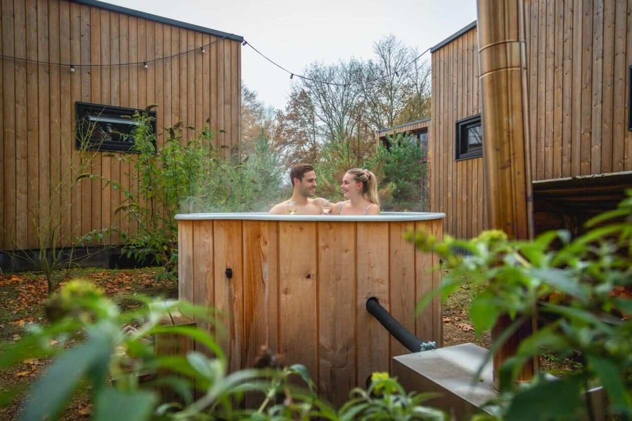 Babymoon - pregnant on holiday, pregnant couple in the hot tub at holiday park EuroParcs De Hooge Veluwe