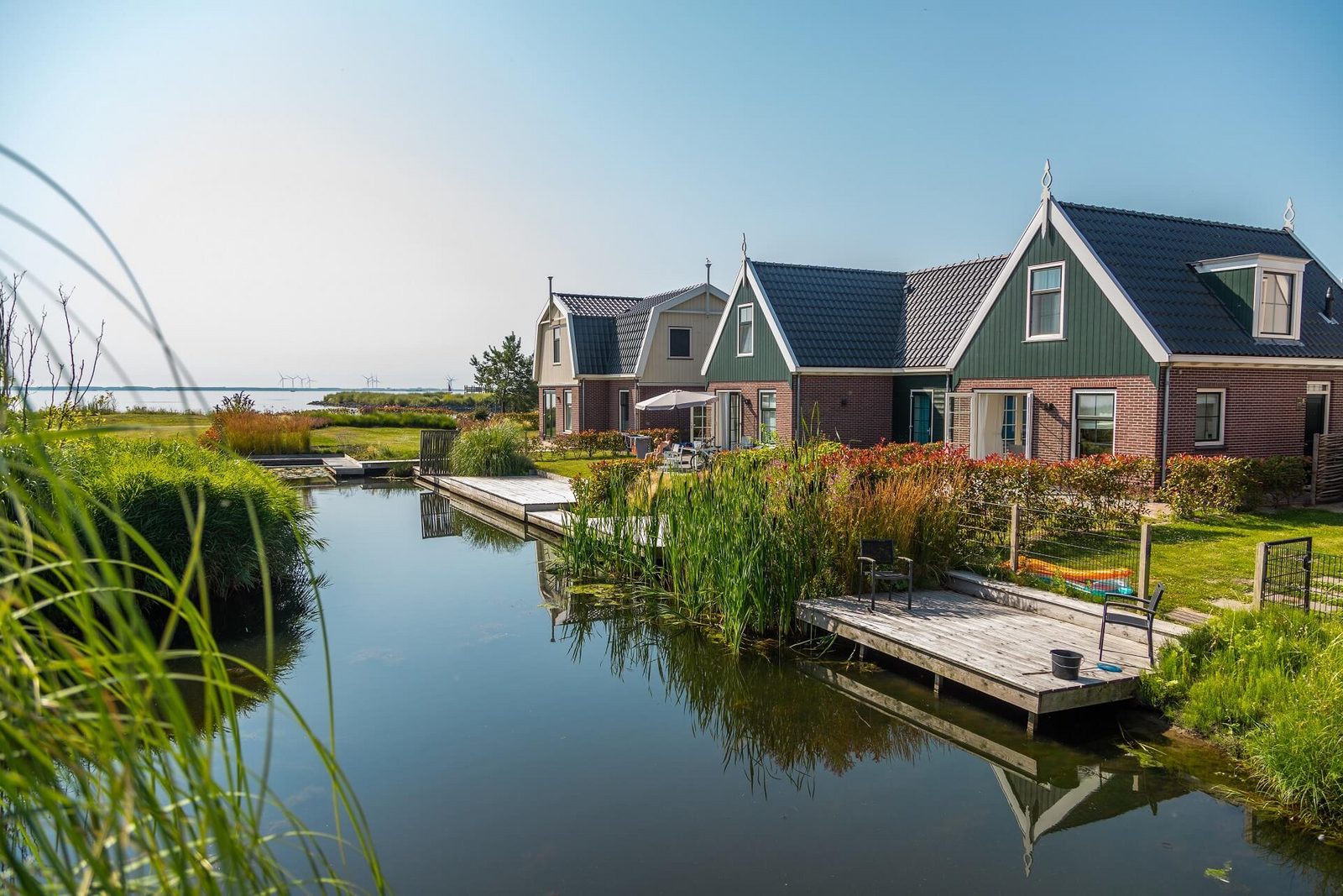 Holiday home Munt or Westertoren by the water at EuroParcs Poort Van Amsterdam in the Netherlands