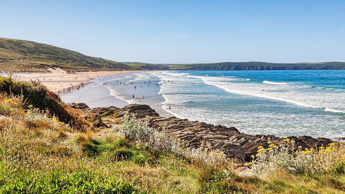 Surfing and sand on Woolacombe Beach in North Devon