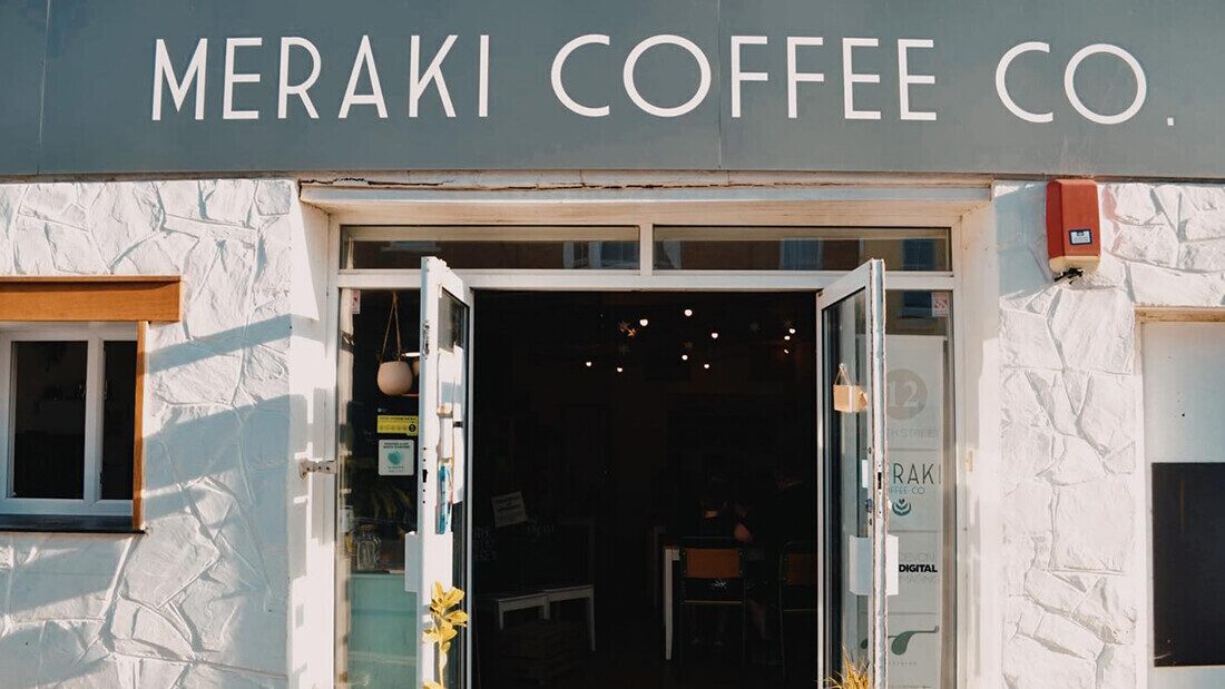 Meraki Coffee Co. – a cosy independent café. Front entrance of Meraki Coffee Co., a modern coffee shop with open doors and a welcoming atmosphere.
