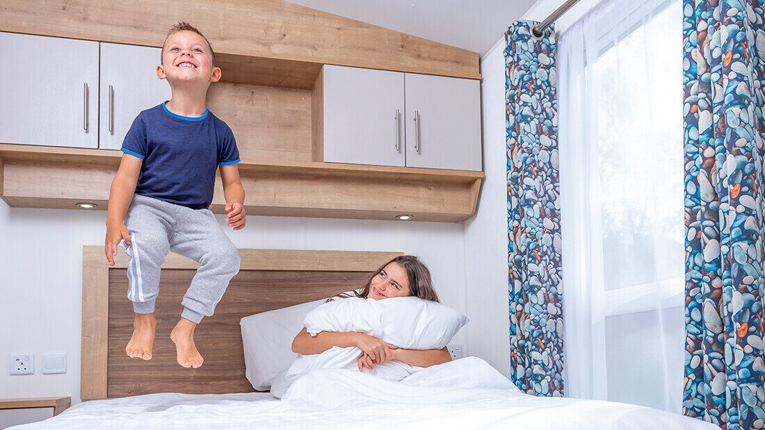 Spacious, modern bedrooms where little ones can play and the whole family can relax after a day of seaside adventures.