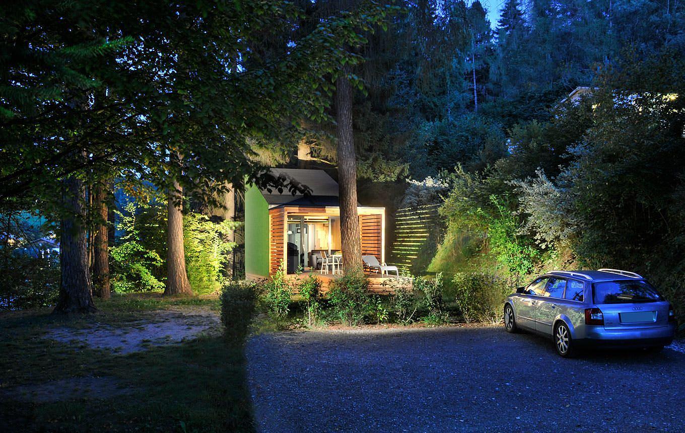 Our architectural highlight, the tiny home 'Green Space' in moody twilight