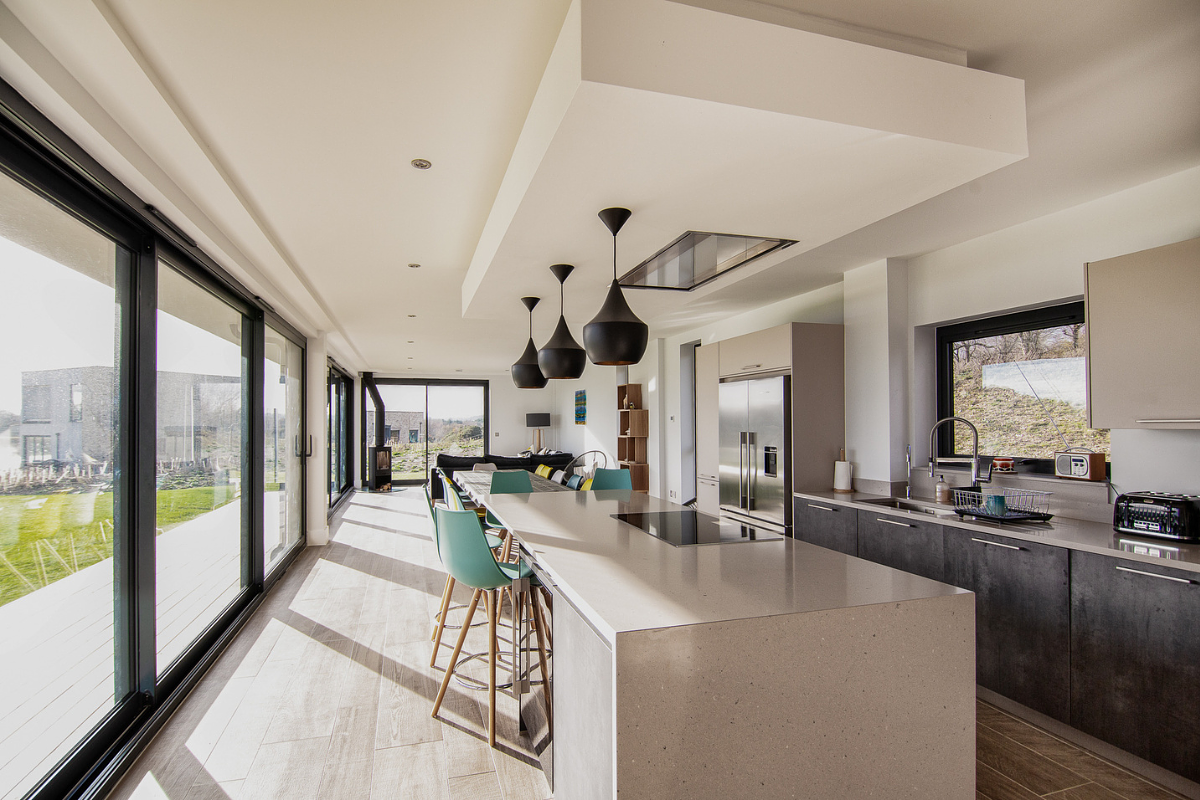 Spacious contemporary kitchen with island and dining area in a Silverlake holiday home, Dorset. Spacious contemporary kitchen with island and dining area in a Silverlake holiday home, Dorset.