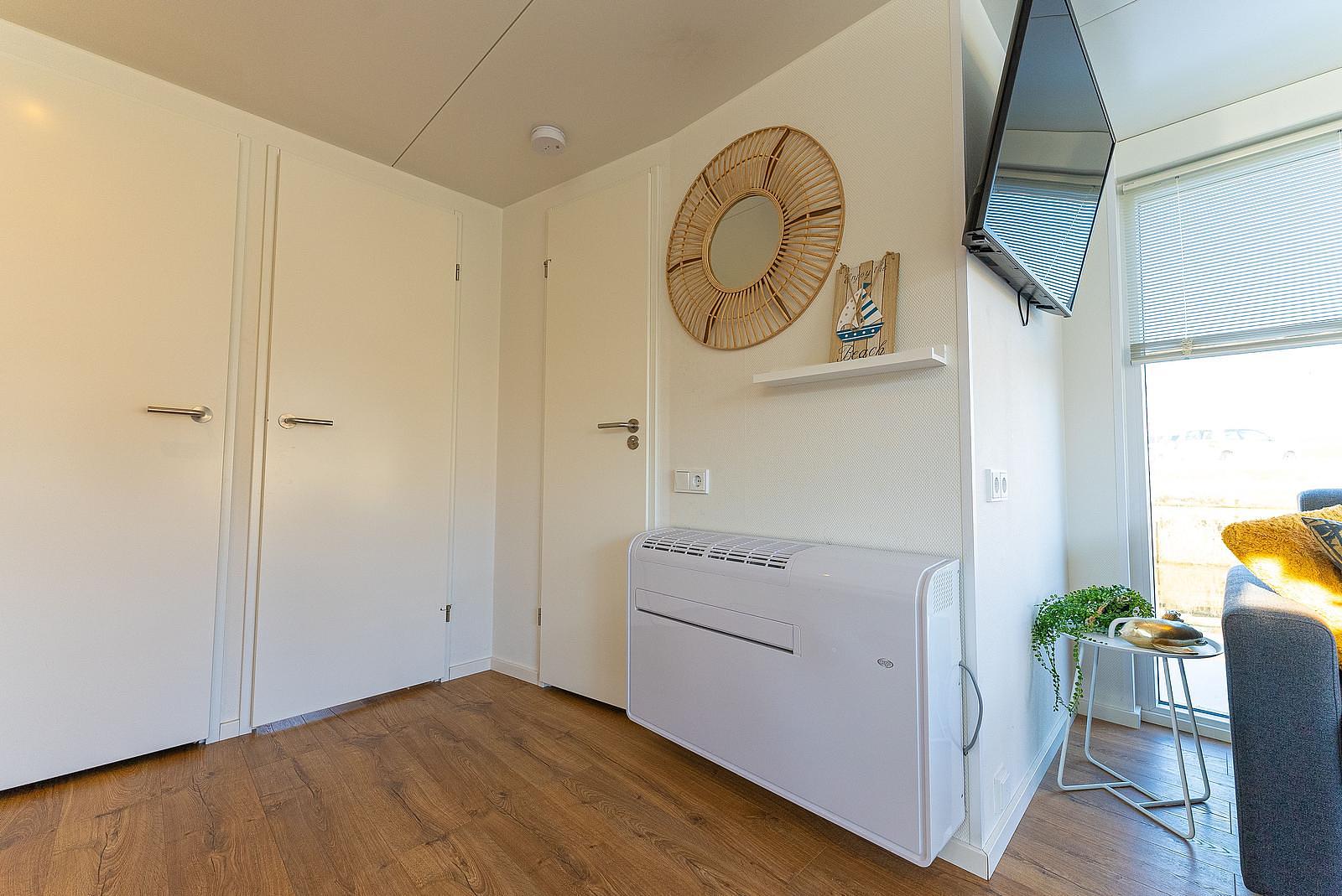 Modern living room with air conditioning and views of the Veerse Meer