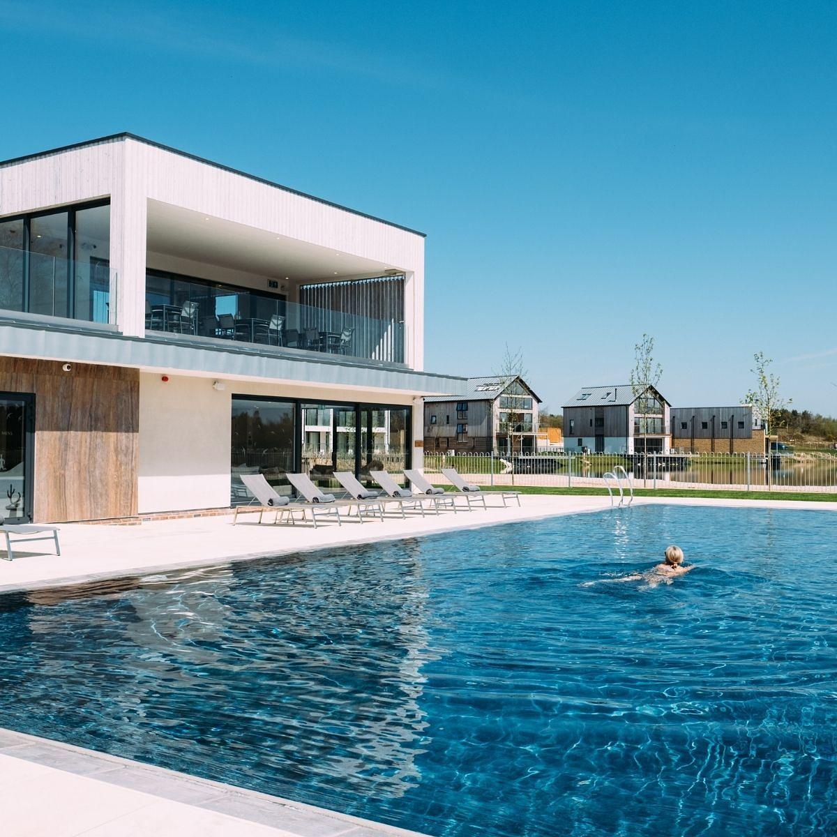 The homeowner-exclusive Hurricane Spa at Silverlake, with a heated outdoor pool and rooftop terrace, set beside Beaumont Lake in the heart of the Dorset countryside.