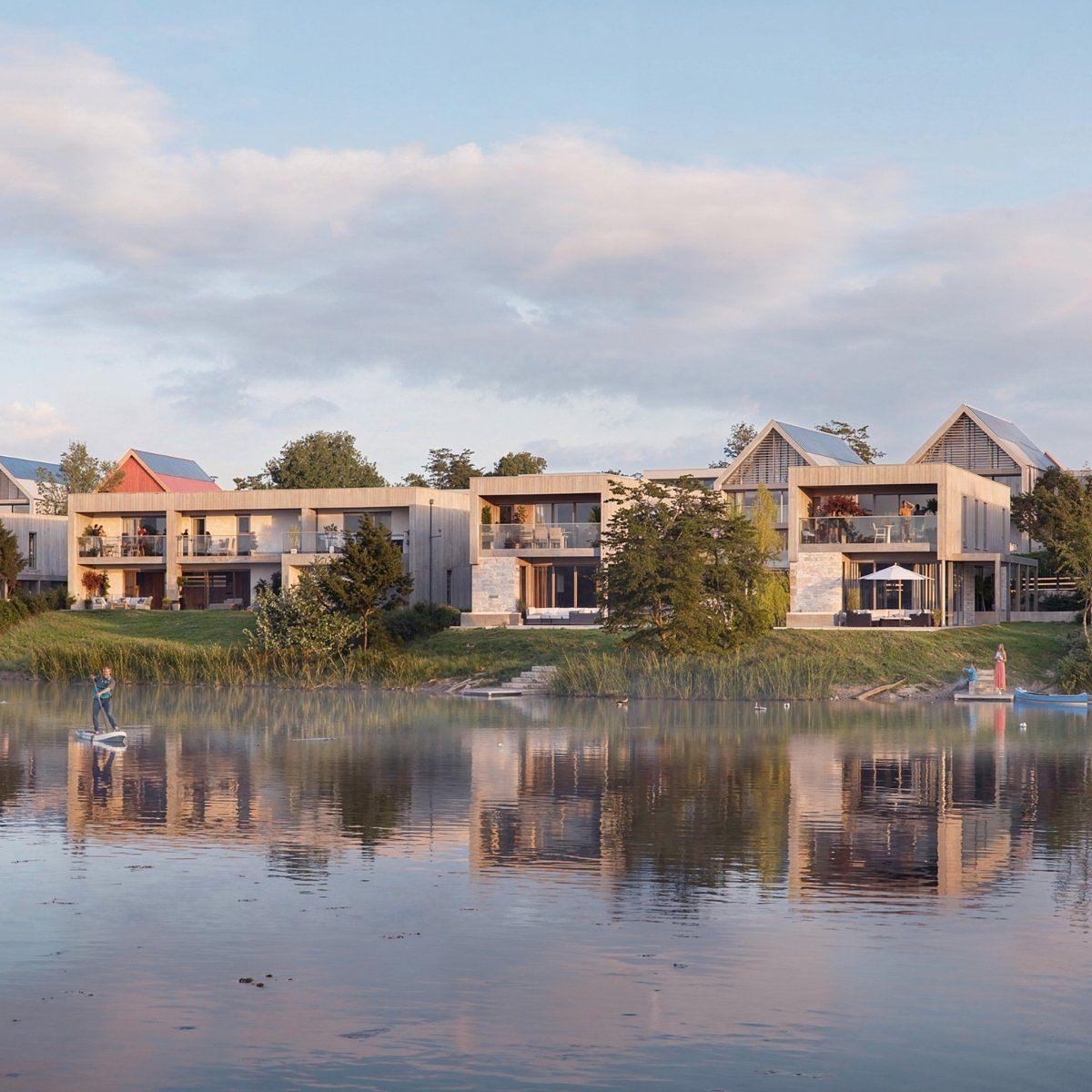CGI of proposed the Deanesly Point at Silverlake Estate, Dorset, featuring contemporary lakeside homes beside a tranquil lake. CGI of proposed the Deanesly Point at Silverlake Estate, Dorset, featuring contemporary lakeside homes beside a tranquil lake.