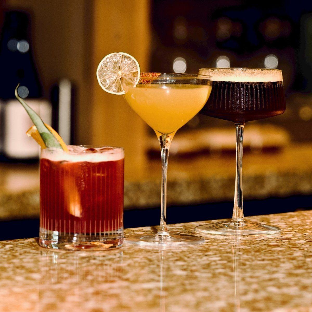 Three handcrafted cocktails served at the Firefly Restaurant at Silverlake Estate, Dorset.